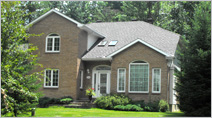 Rancourt Roofing reroof with architectural shingles and skylights
